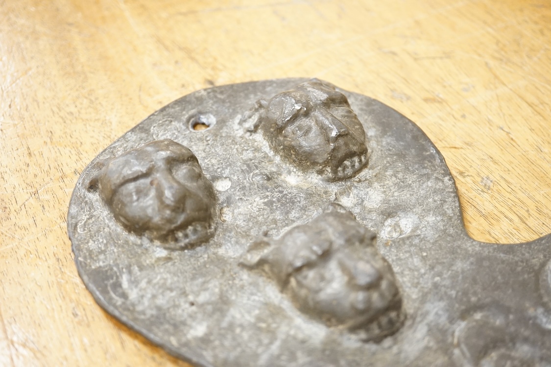 A reproduction Salop cast iron ‘The Iron Bridge 1779’ plaque together with a lead fire-mark, Salop Fire Office, latter 19cm high